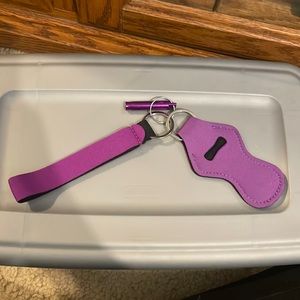 Chapstick holder with safety whistle